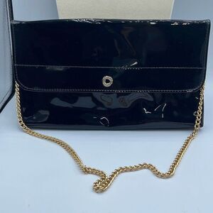 Vintage faux black patent leather shoulder bag.